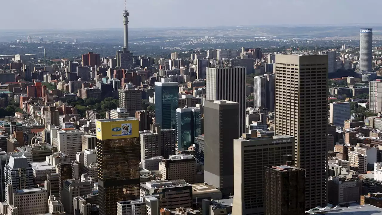 A building marked by fire and death shows the decay of South Africa's 'city of gold'