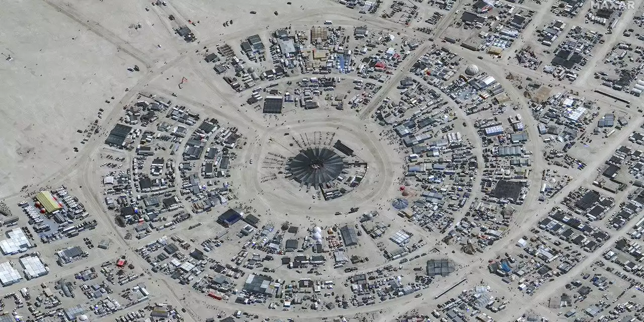 Burning Man flooding strands tens of thousands at Nevada site; authorities are investigating 1 death