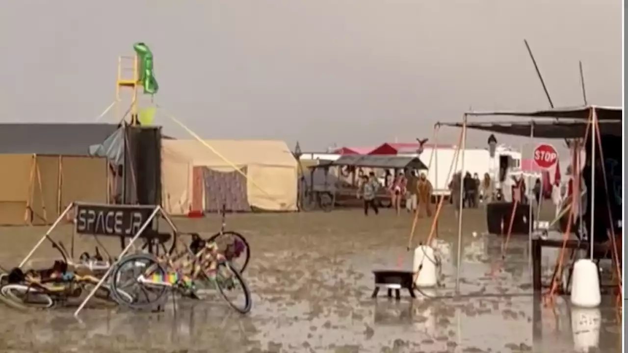 Death at Burning Man investigated as rain-soaked festival asks attendees to shelter in place