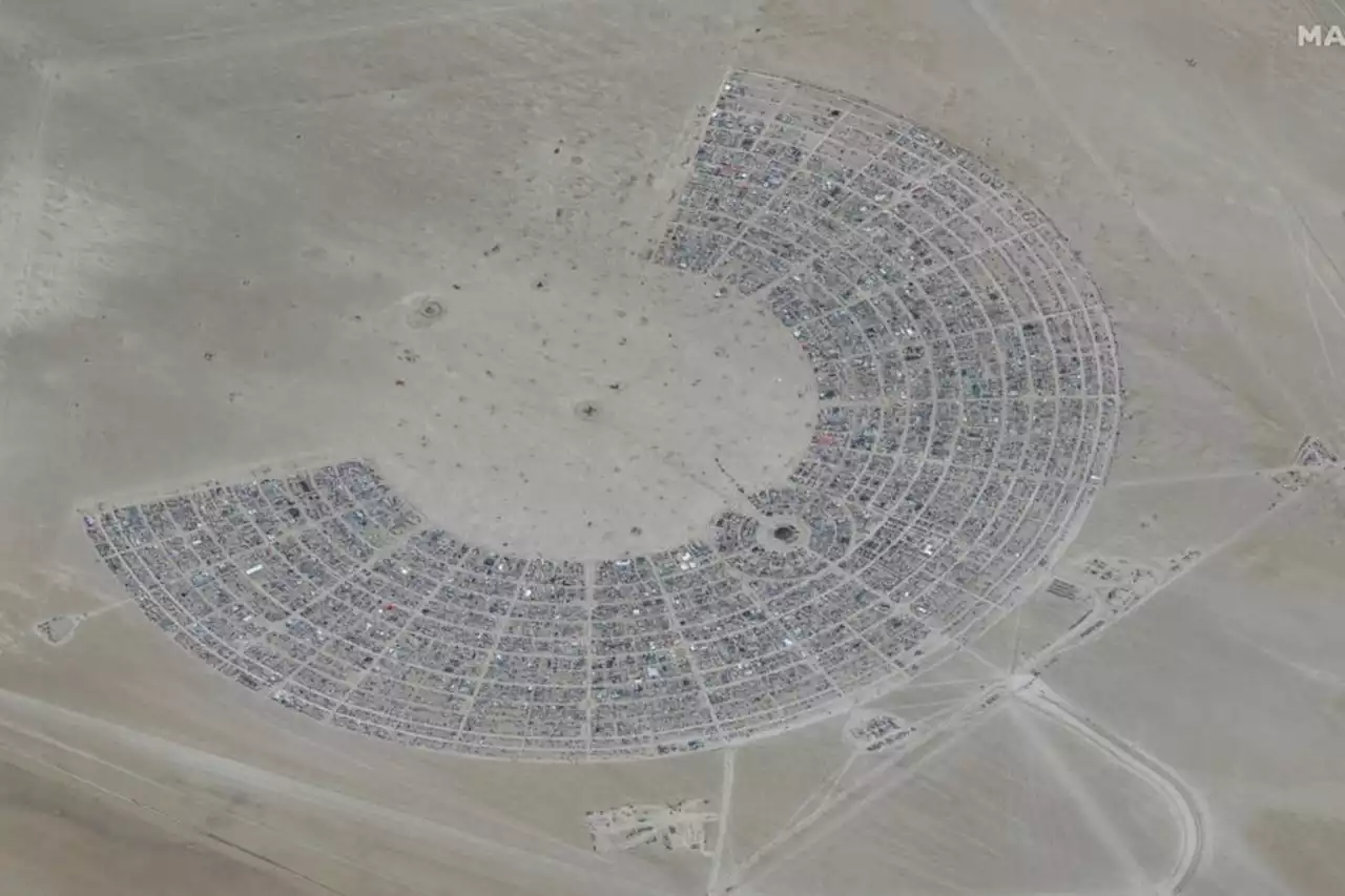 Burning Man revellers told to conserve food and water as event is washed out