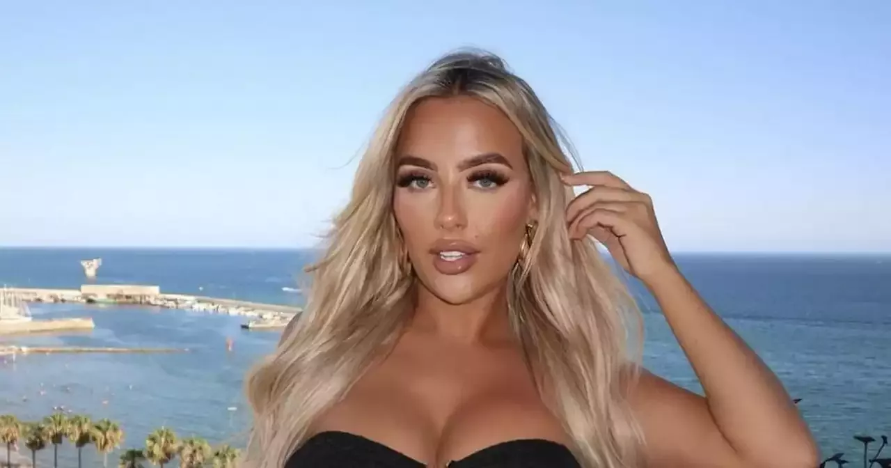 Love Island winner Jess Harding's getaway as she stuns in blue dress