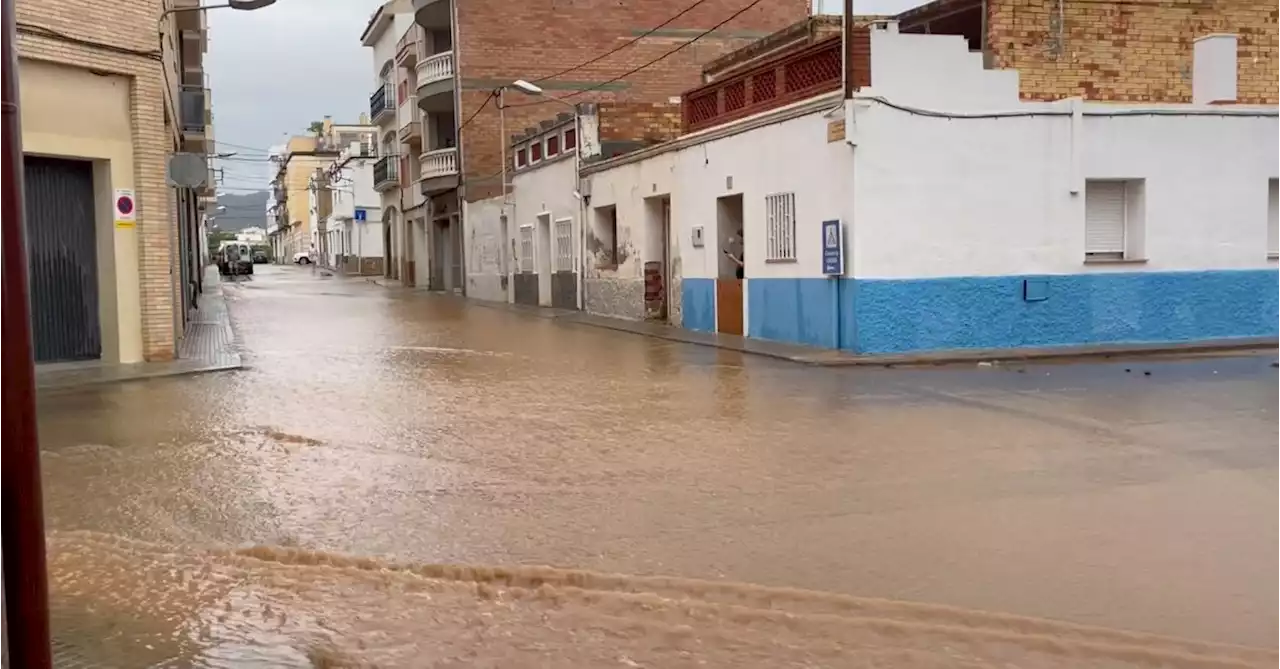 Madrid residents told to stay at home as torrential rain sweeps across Spain