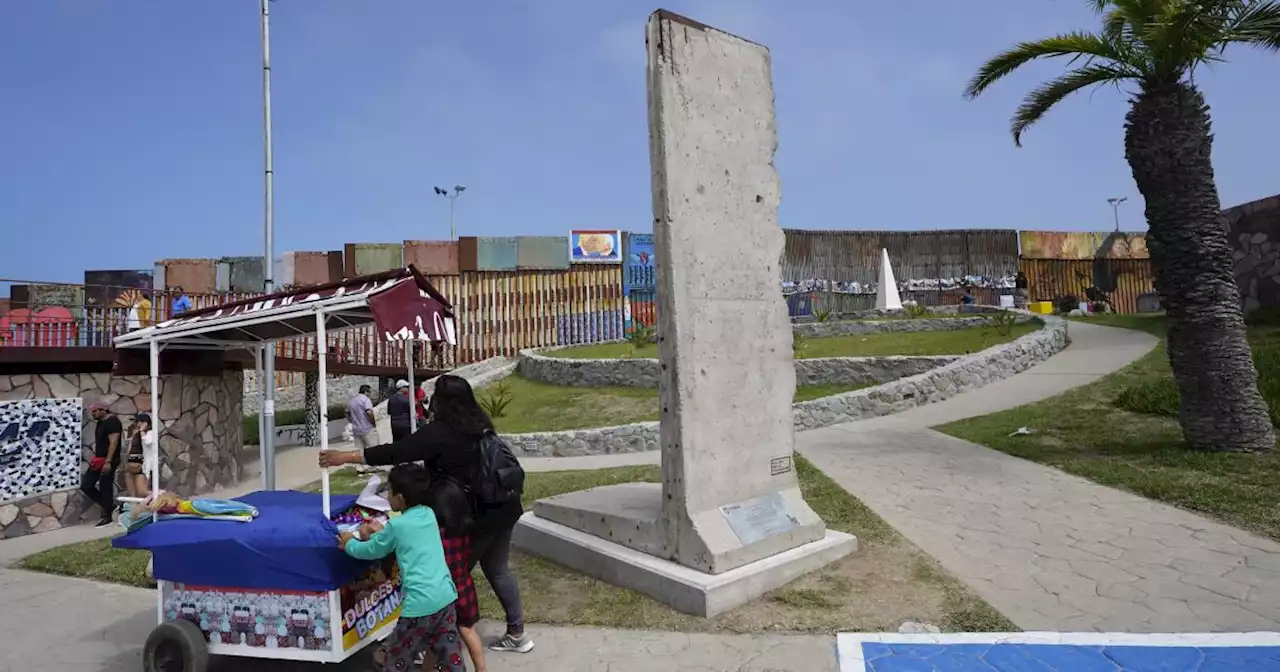 Berlin Wall relic gets a 'second life' on US-Mexico border as Biden adds barriers