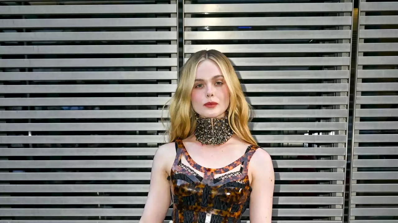 Elle Fanning Wore One Of Sarah Burton’s Earliest – And Buzziest – McQueen Creations To Watch Her Final Show