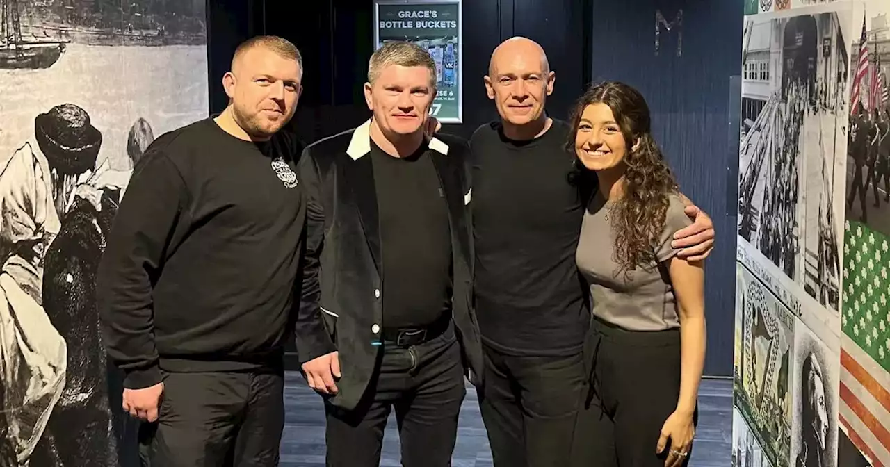 Ricky Hatton is all smiles inside Glasgow bar as boxing legend poses with staff