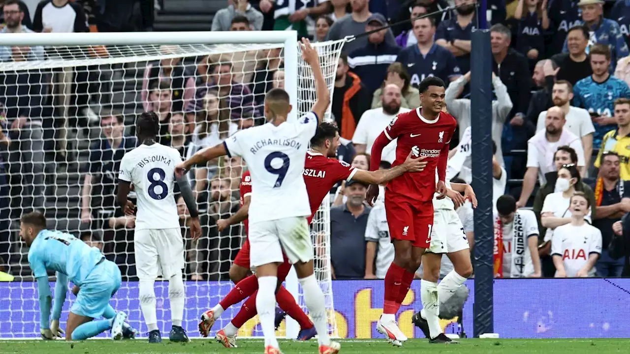 Bad to worse: Cody Gakpo leaves Tottenham's stadium with right leg in a brace after nine-man Reds lose to Spurs in injury time