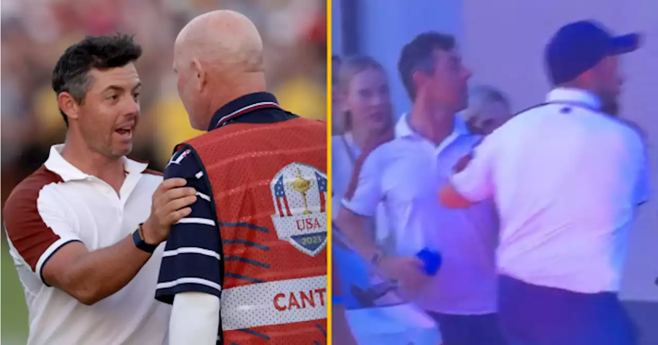 Shane Lowry holds Rory McIlroy back during Ryder Cup car park row