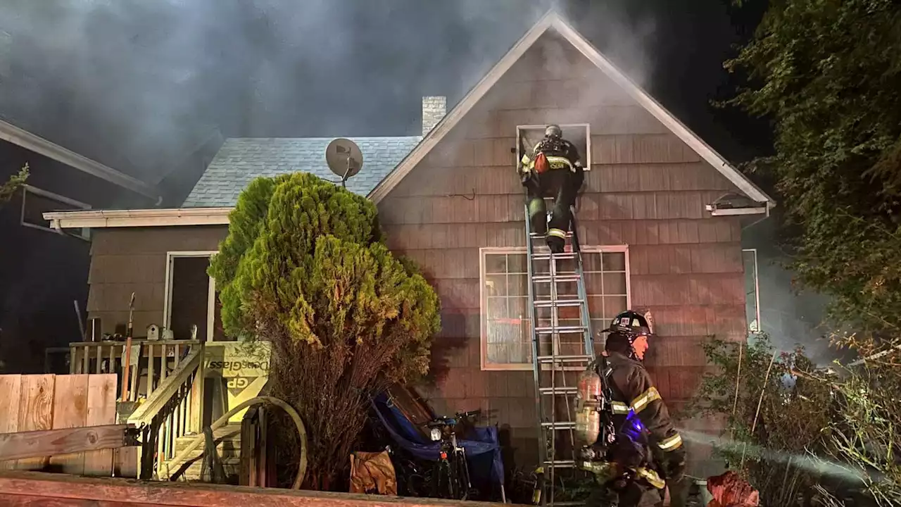 Seattle firefighters battle 2-story house fire in Green Lake