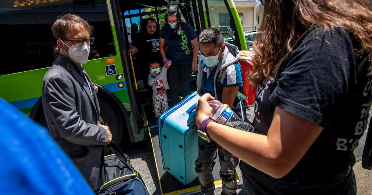 Three more buses carrying dozens of asylum seekers arrive in L.A. from Texas