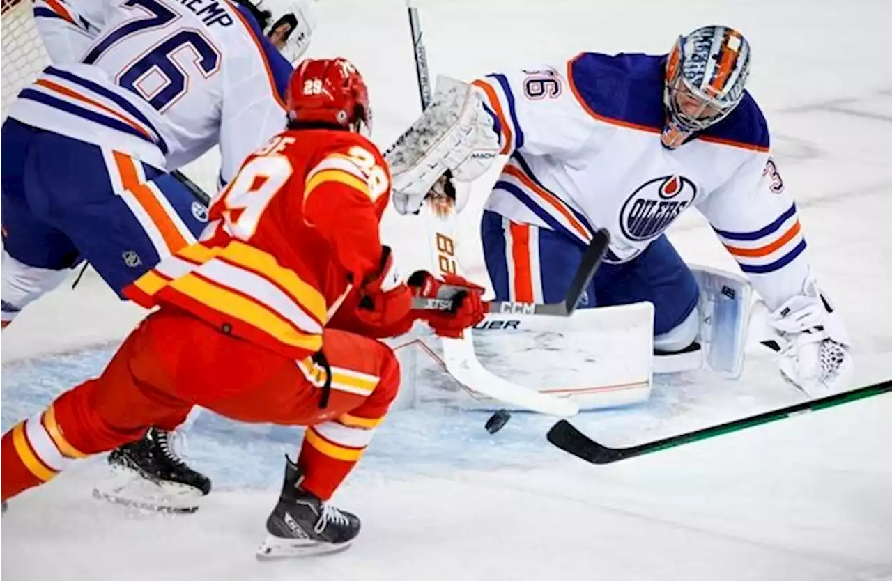 Malone scores in OT as Oilers rally to beat Flames 2-1