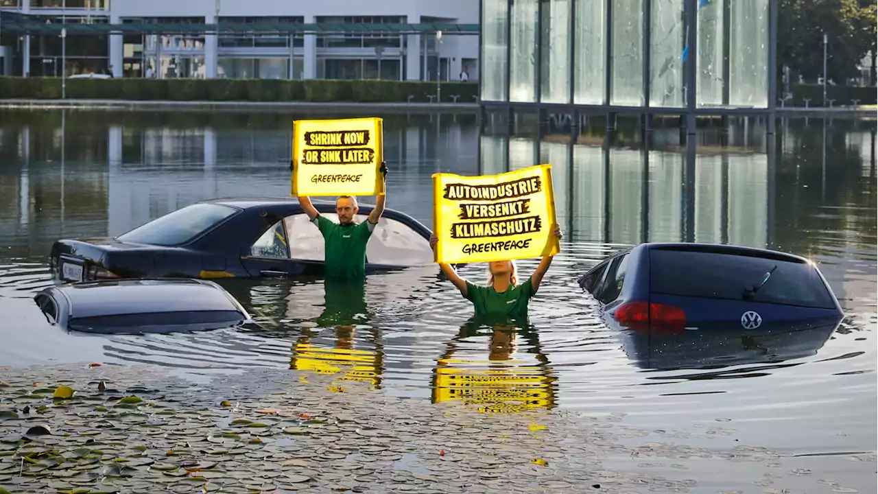 Climate Activists Protest By Sinking Vehicle Parts At The Munich Motor Show