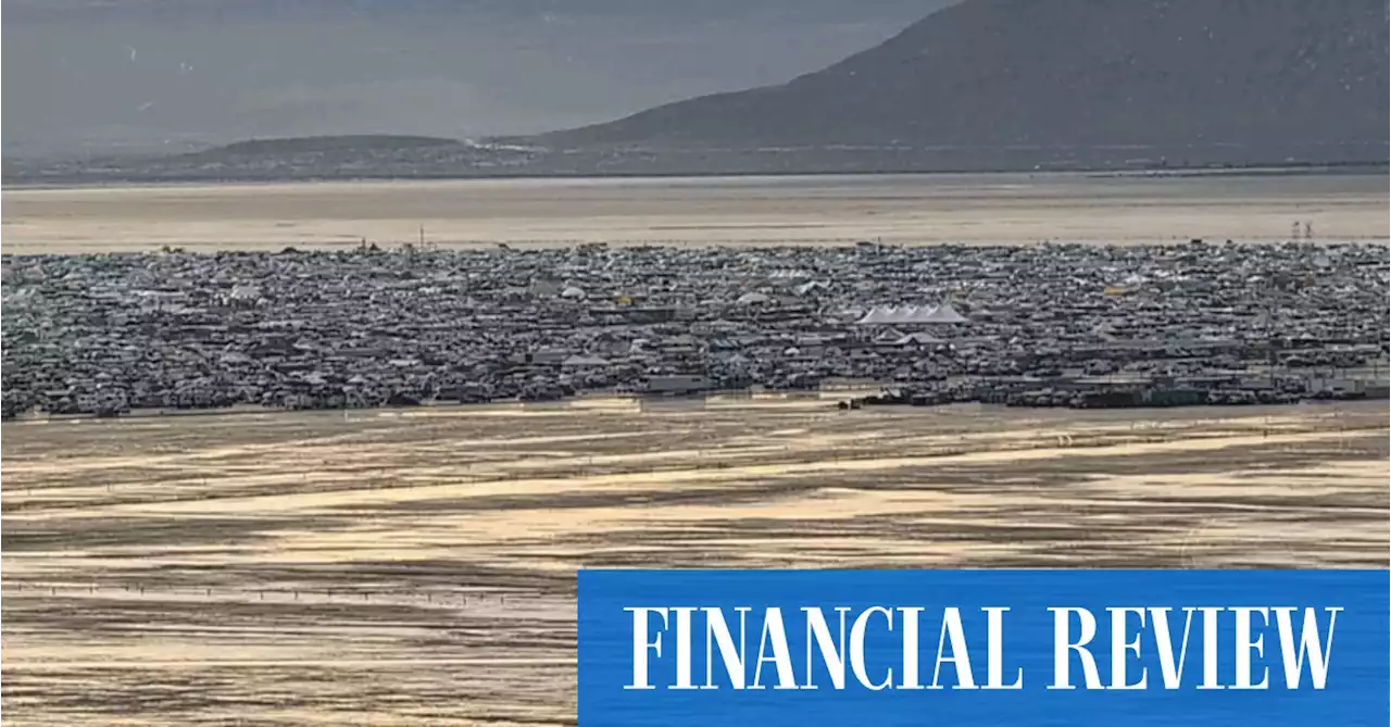 Thousands stranded, one person dies as floods hit Burning Man festival