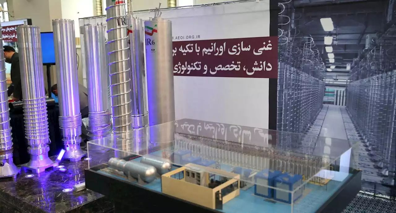 UN nuclear watchdog report says Iran slows its enrichment of near-weapons-grade uranium