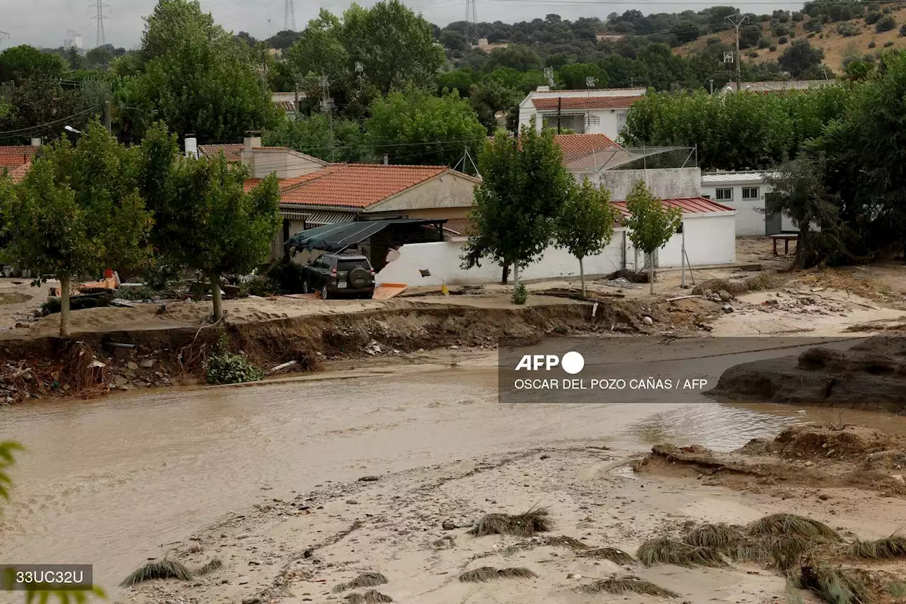 Two dead, one missing as torrential rains lash Spain