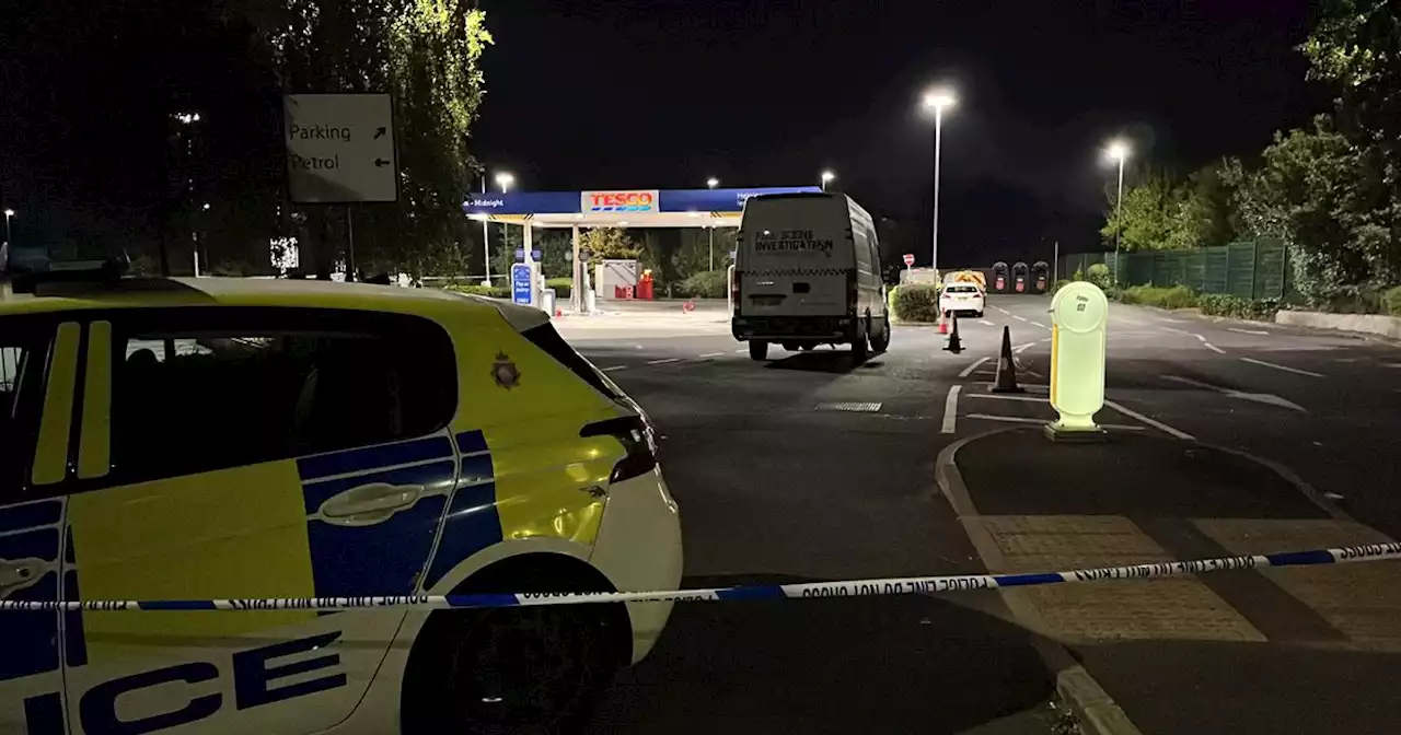 Large police scene at petrol station after man reportedly 'set himself alight'