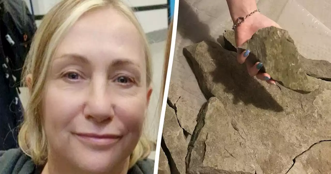 Woman lucky to be alive after huge castle wall slab falls 30ft onto her head