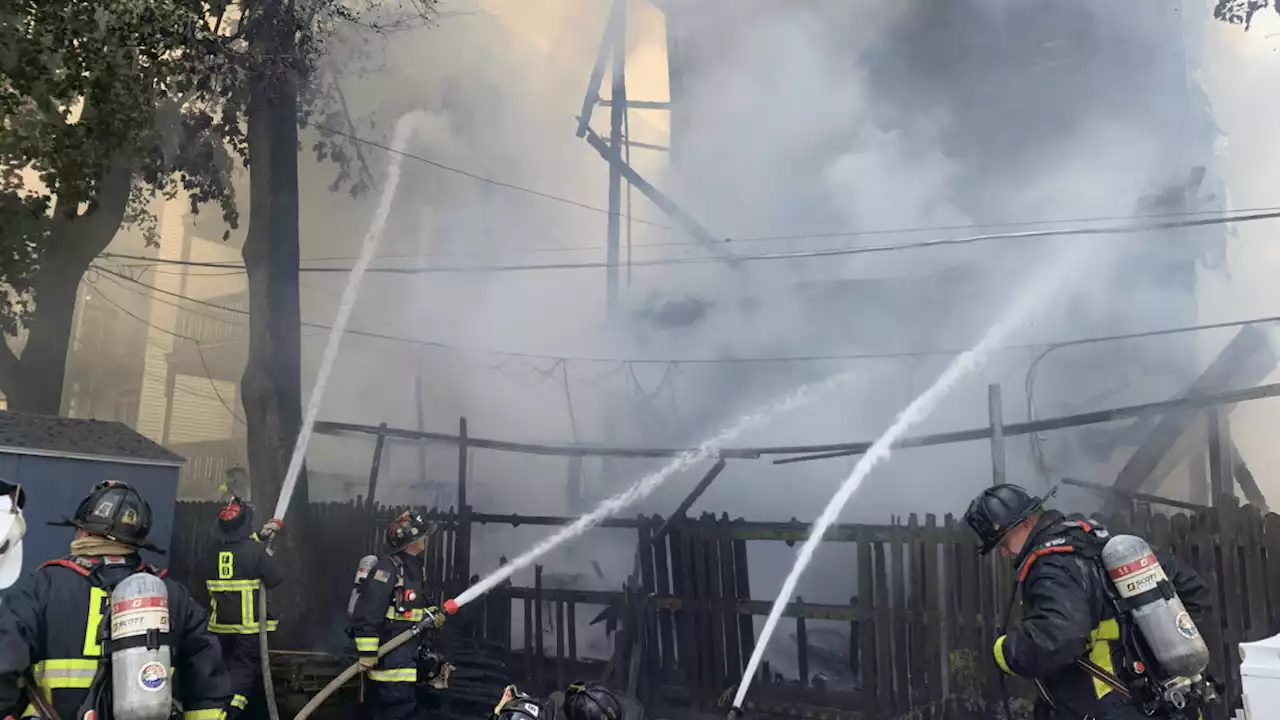 Large fire destroys Dorchester home, spreads to others nearby