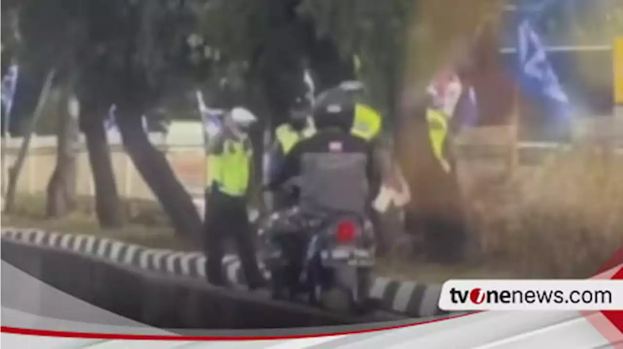 Viral! Polisi Melengos Biarkan Pengendara Motor Bercelana Loreng Lintasi Jalur Busway