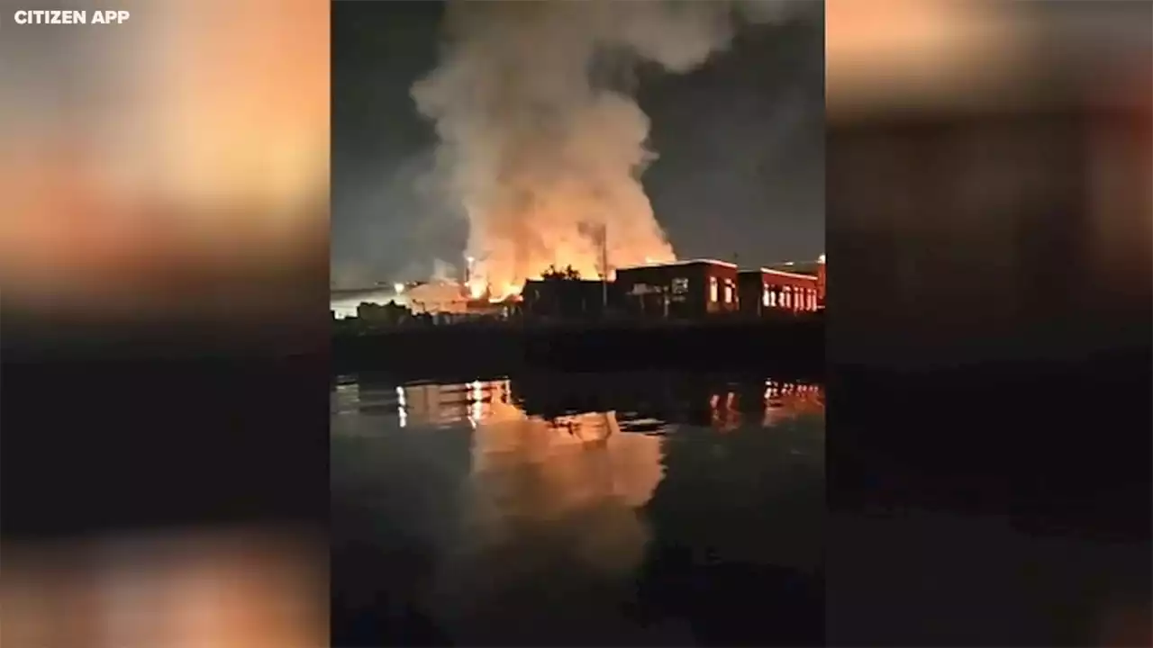 Firefighters injured while battling flames at Department of Transportation warehouse in Queens