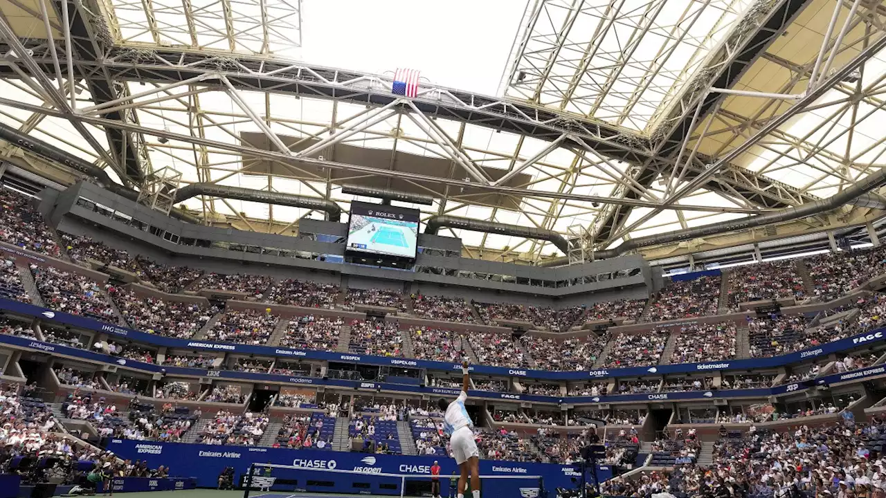 Two roofs at the US Open were partially shut because of rising heat and humidity