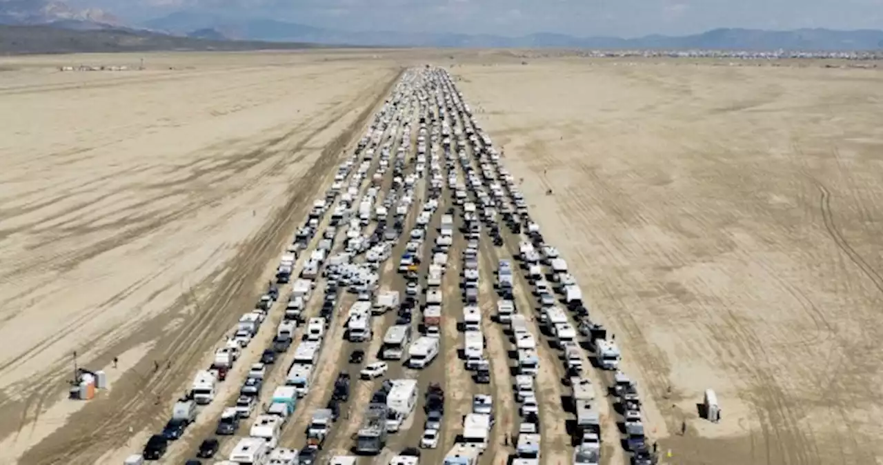 Burning Man road reopens, allowing festival-goers to escape muddy mess