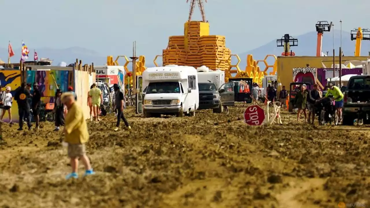 Burning Man festival exodus begins through drying mud