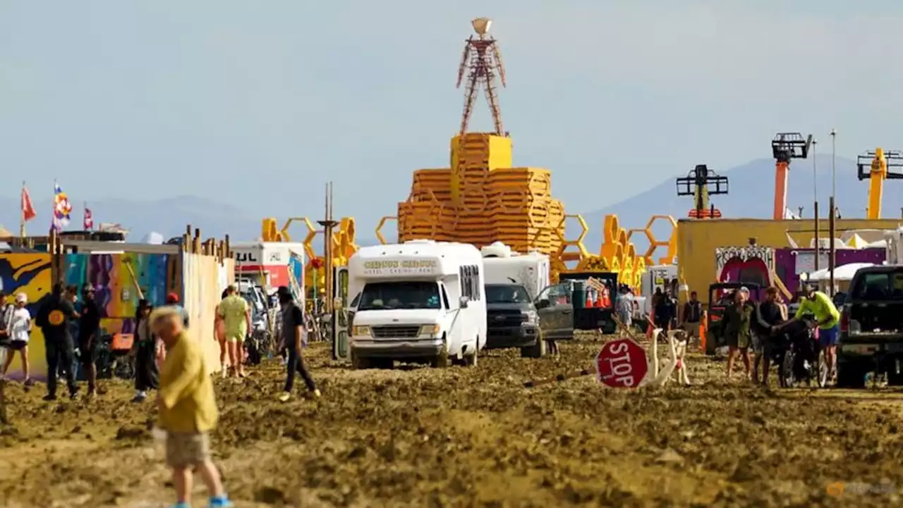 Burning Man festival road reopens, allowing thousands to escape muddy trap