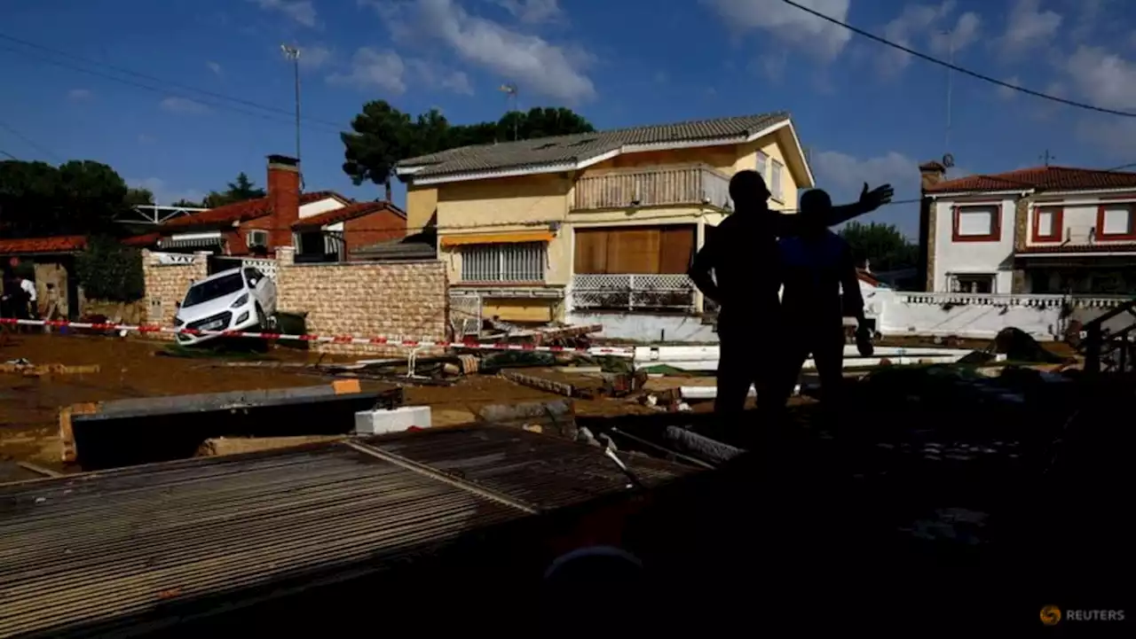 Police search for three missing people in deadly Spain floods, trains resume