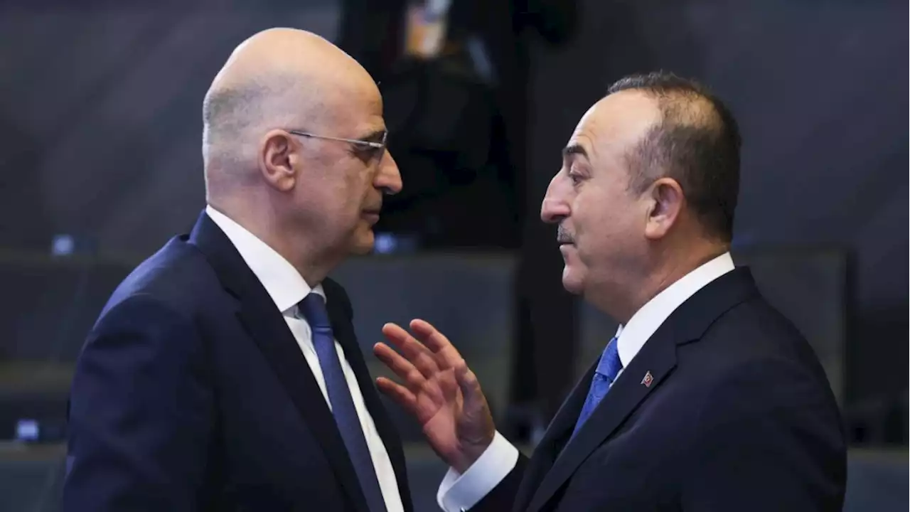 Turkish and Greek foreign ministers discuss troubled ties in a more friendly climate