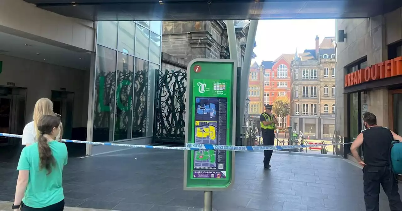 Woman falls from Trinity Leeds as police cordon shops