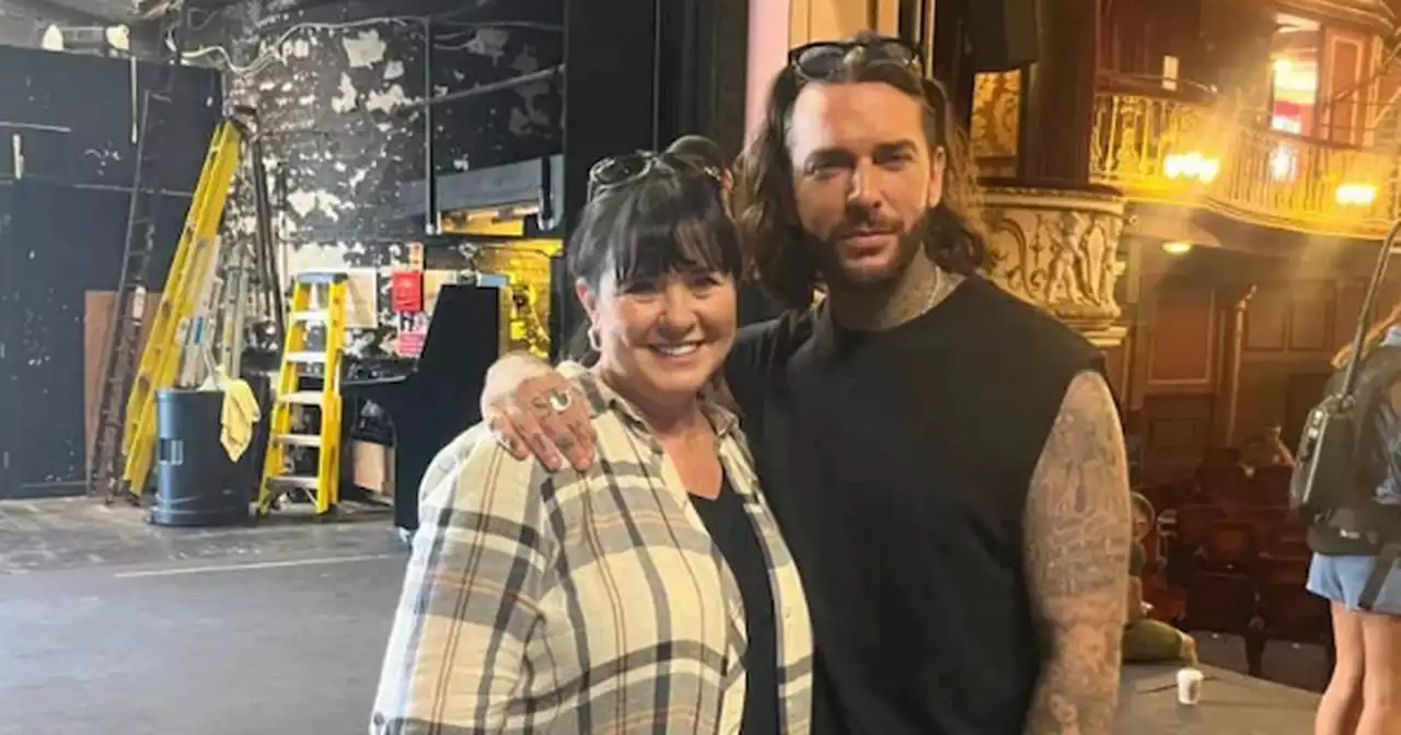 Coleen Nolan poses for a picture with ex TOWIE star as he prepares to strip off