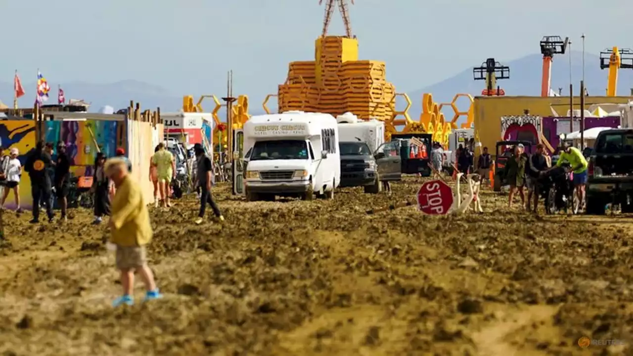 Burning Man road reopens, allowing festival-goers to escape muddy mess