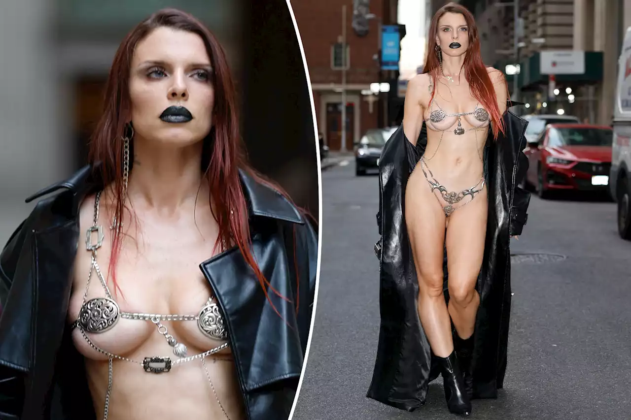 Julia Fox risks wardrobe malfunction while posing almost completely nude at NYFW event