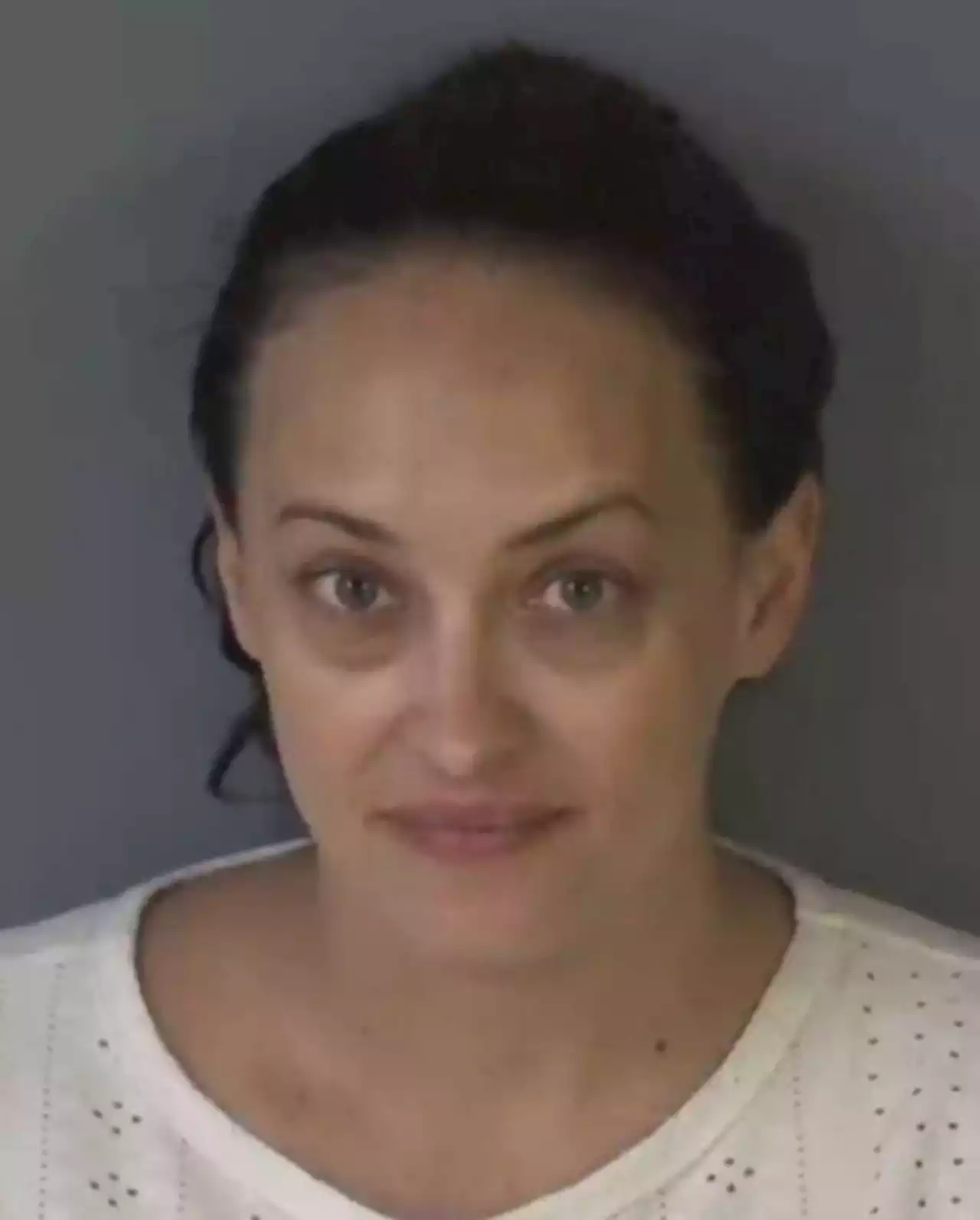 A Clay County cheerleading coach arrested for stealing more than $20,000 from organization