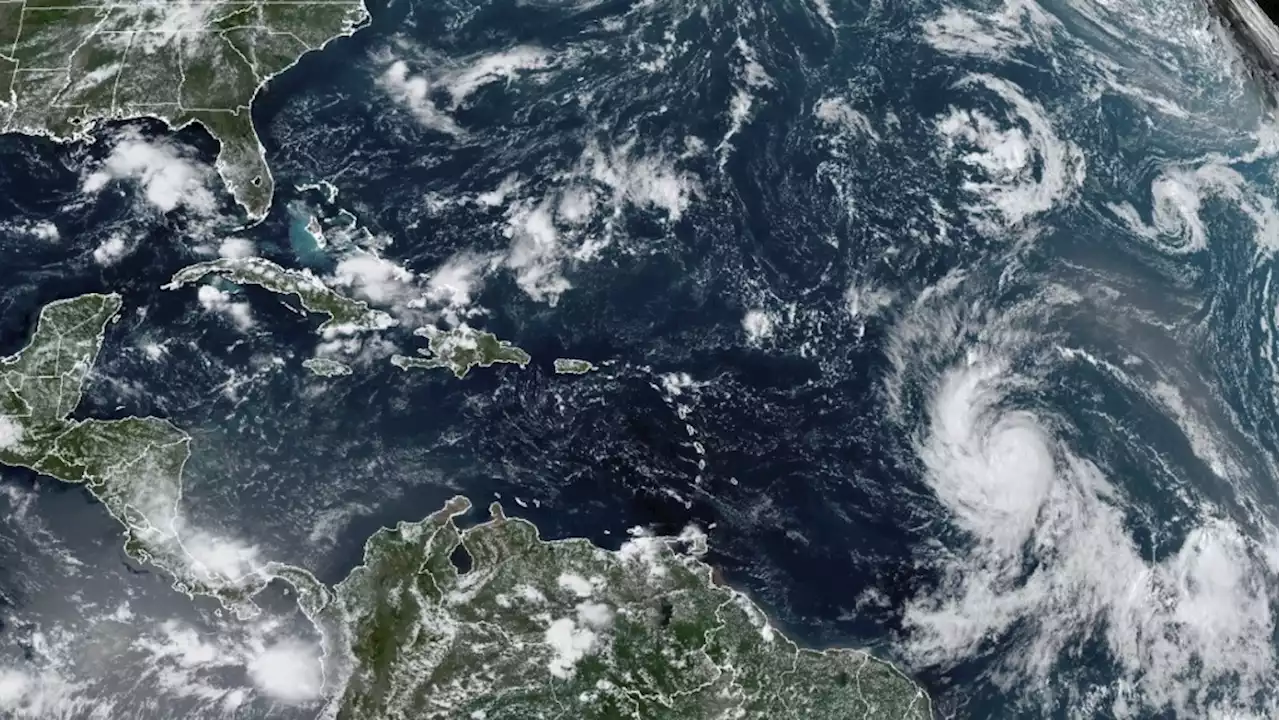 Tropical Storm Lee strengthens into a hurricane as it churns across Atlantic toward Caribbean