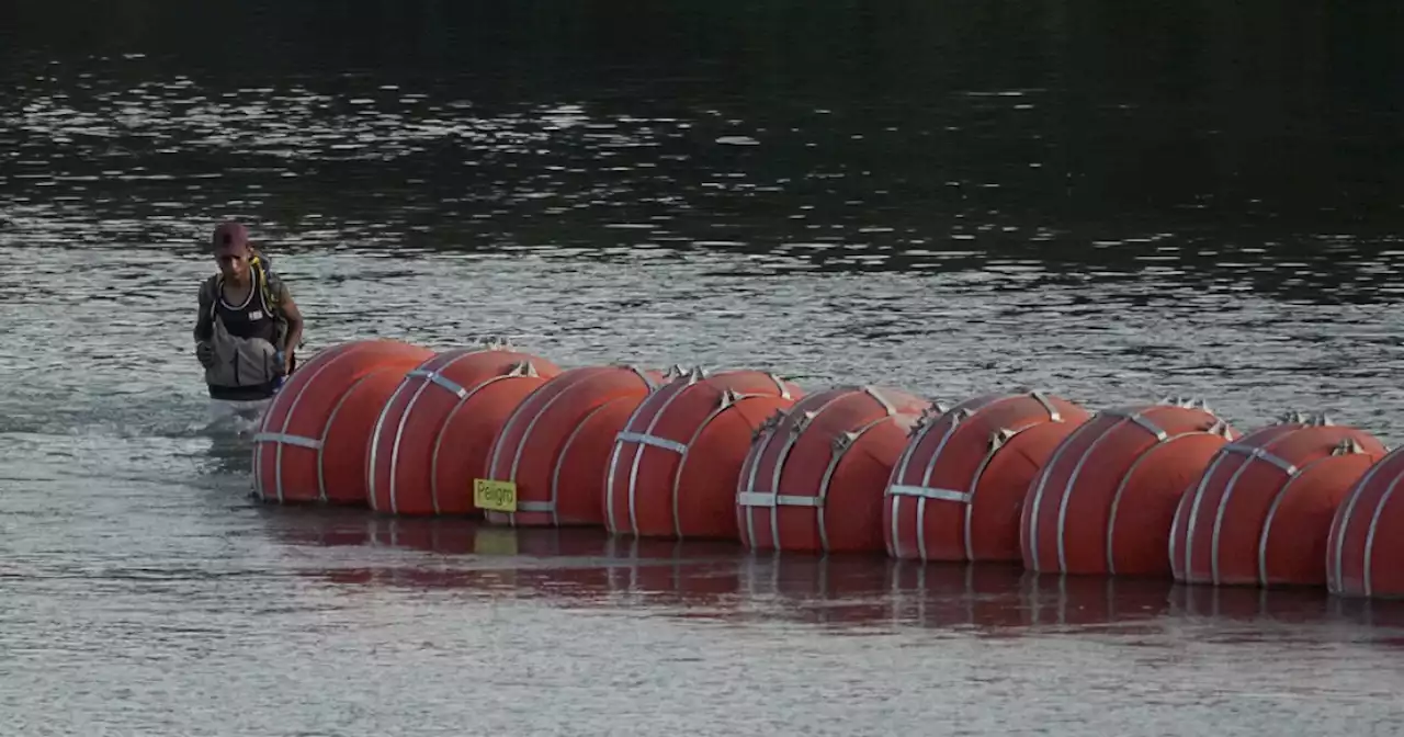 Texas ordered to remove Rio Grande barrier as trial continues