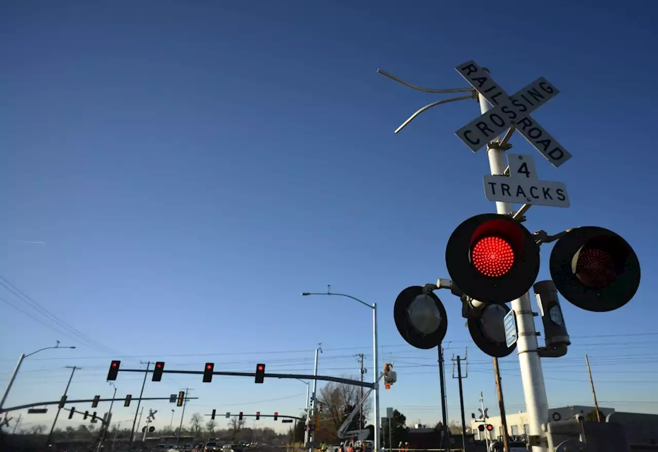 Rail crossing gates stuck in down position on Alameda in Aurora