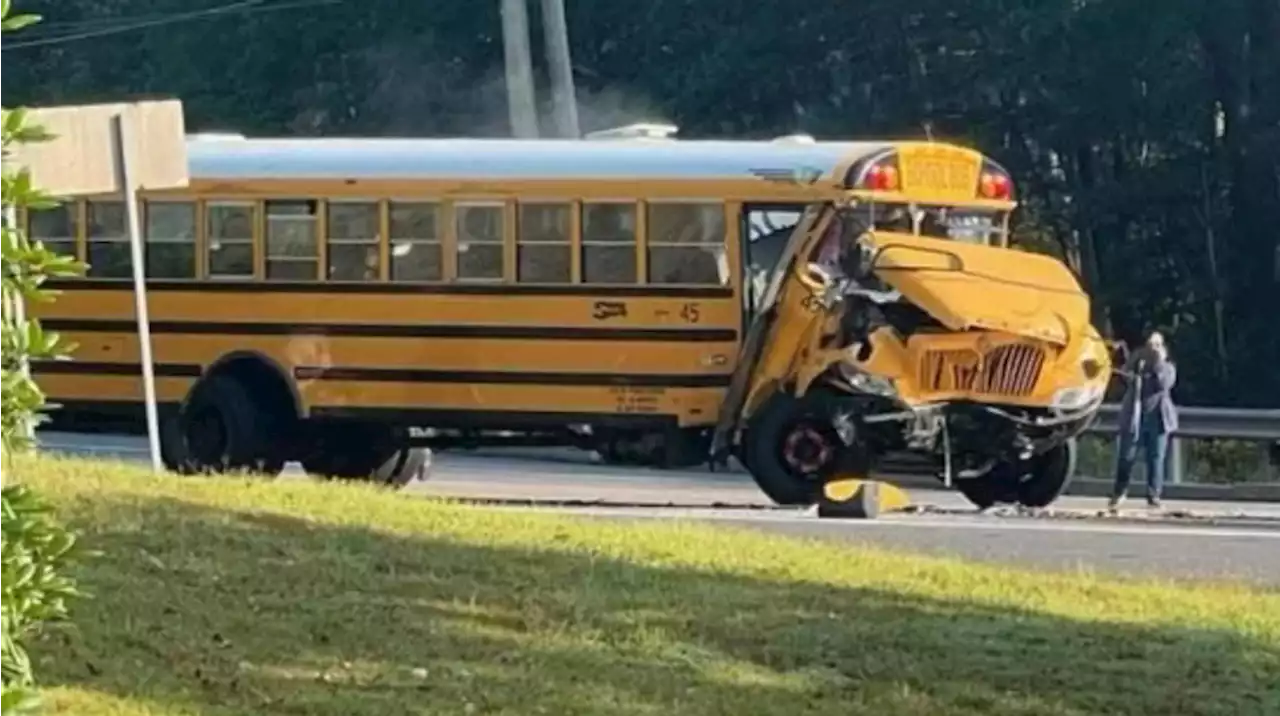 52 students, 2 adults taken to hospital after tow truck collides head-on with school bus