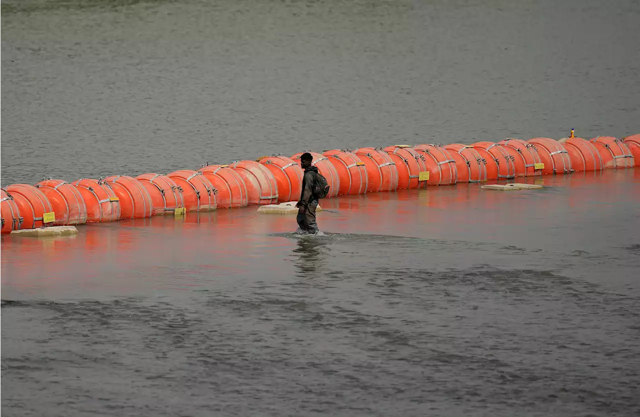 Judge orders Texas to remove disputed river border buoys by Sept. 15