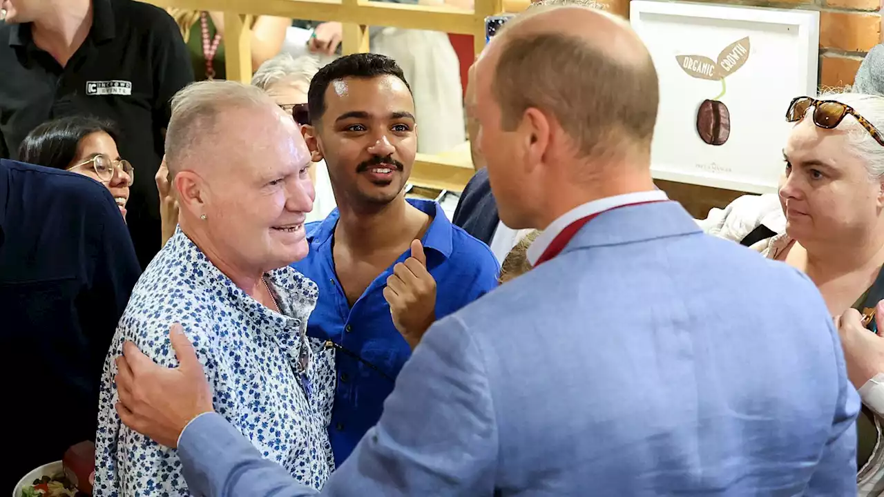 Former England star Paul Gascoigne kisses Prince William during visit to Bournemouth Pret A Manger