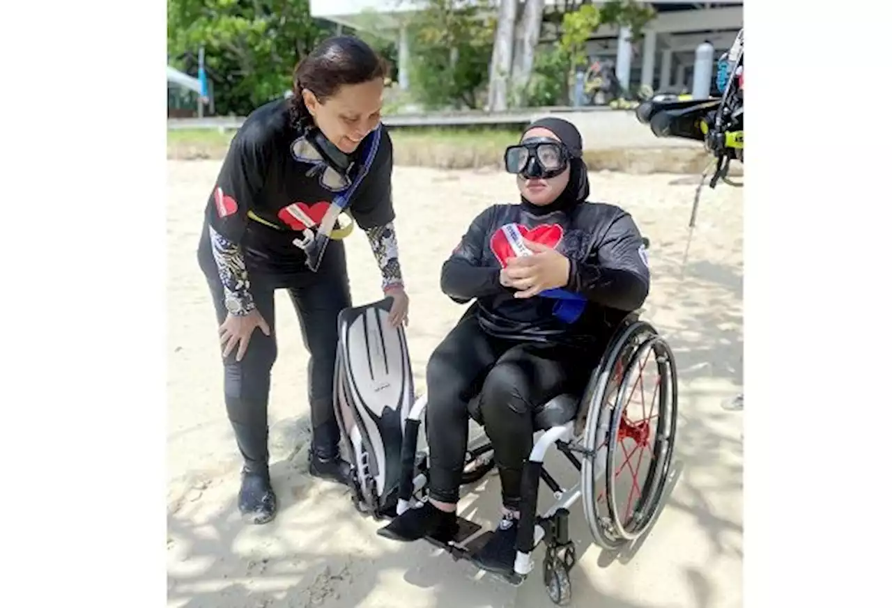 Scuba diving programme in KK opens 'whole new world' to wheelchair users