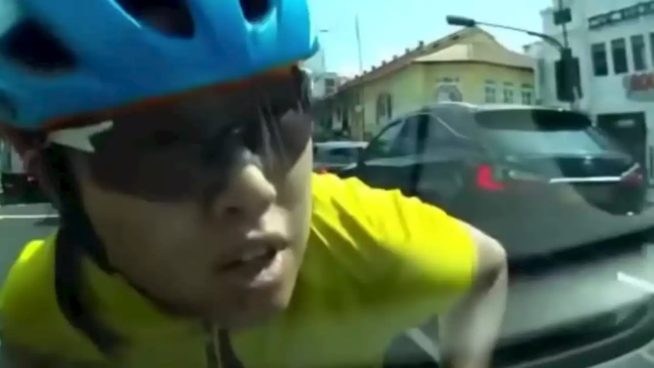 Cyclist who jumped onto car bonnet in Katong as vehicle drove off gets new harassment charge