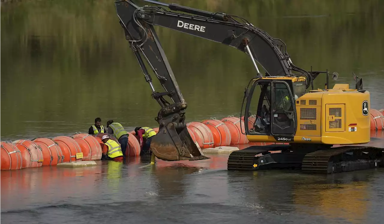 Judge orders Texas to move floating barrier off Rio Grande to riverbank