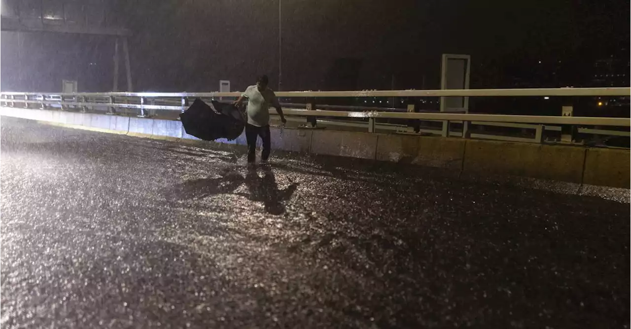 Hong Kong hit by widespread flash flooding after heaviest rainfall since 1884