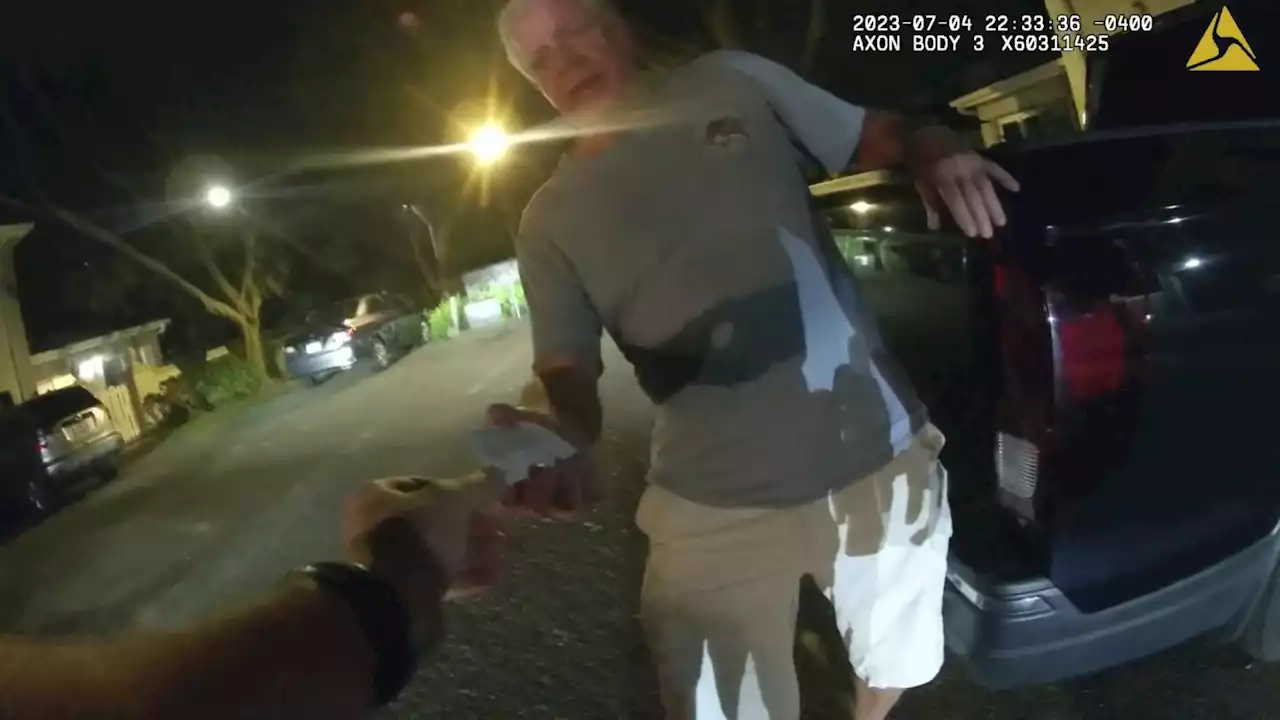 Body cam shows prolific federal drug prosecutor offering cops business card in DUI crash arrest