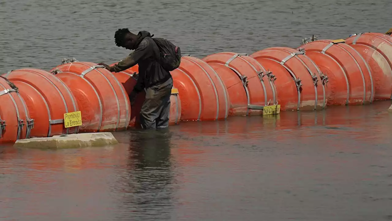 Court order allows Texas' floating barrier on US-Mexico border to remain in place for now