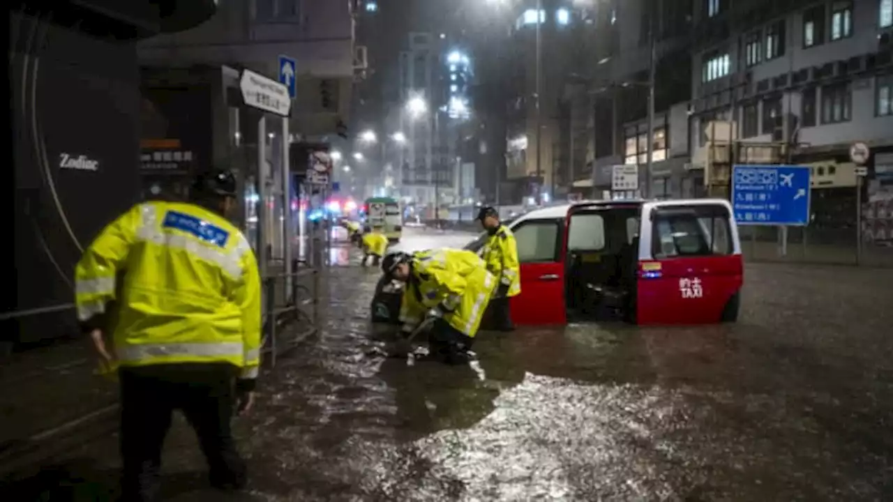 Hong Kong's heaviest rain in at least 140 years floods city streets, metro