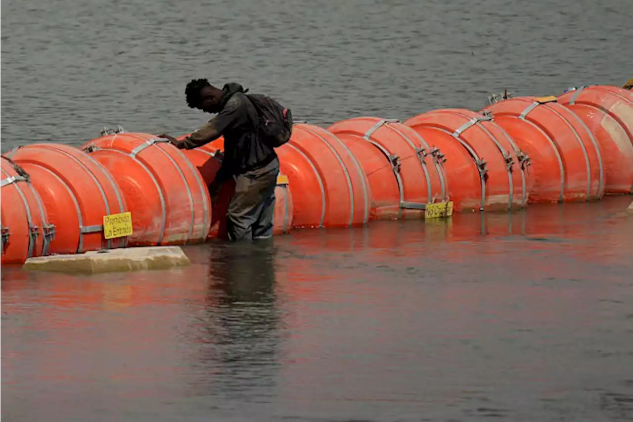 Court order allows Texas' floating barrier on US-Mexico border to remain in place for now