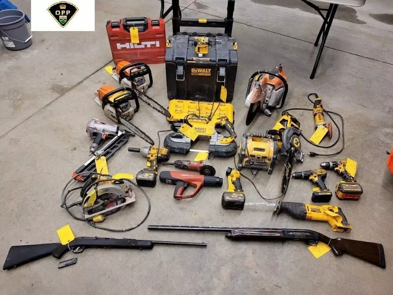 OPP charge two as South Frontenac raid yield cache of stolen firearms, tools