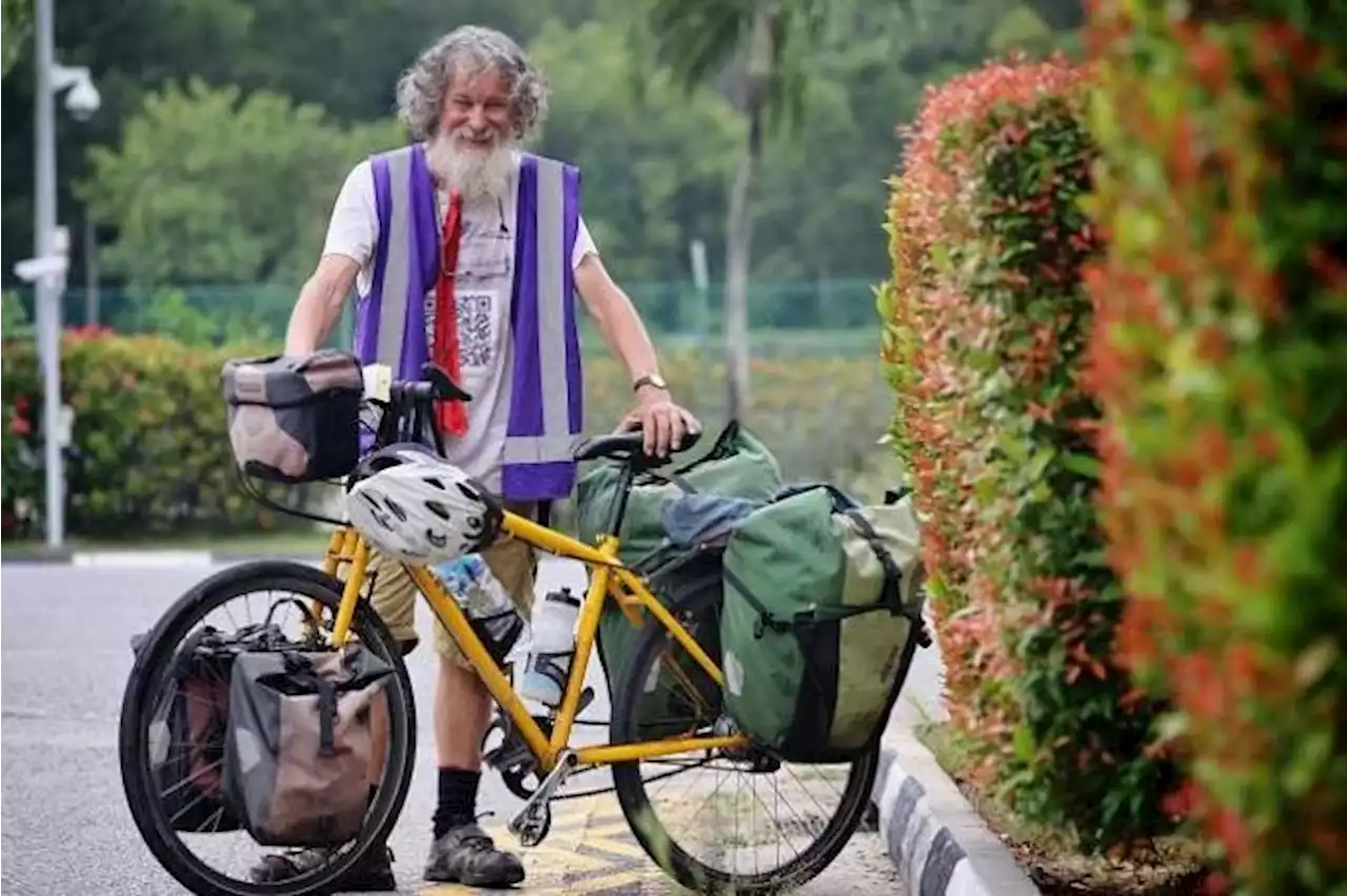 65-year-old Australian cycles over 9,000km from Australia to Singapore